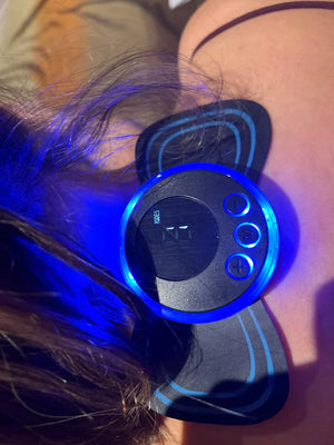 NüVIBE™ - Masajeador Portatil